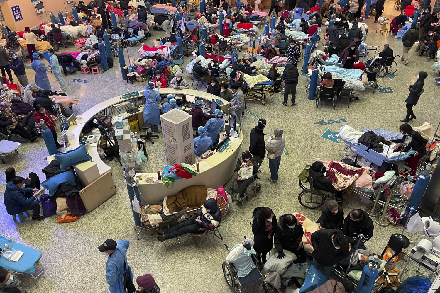 Chinese hospitals creak under the strain of a huge Covid outbreak